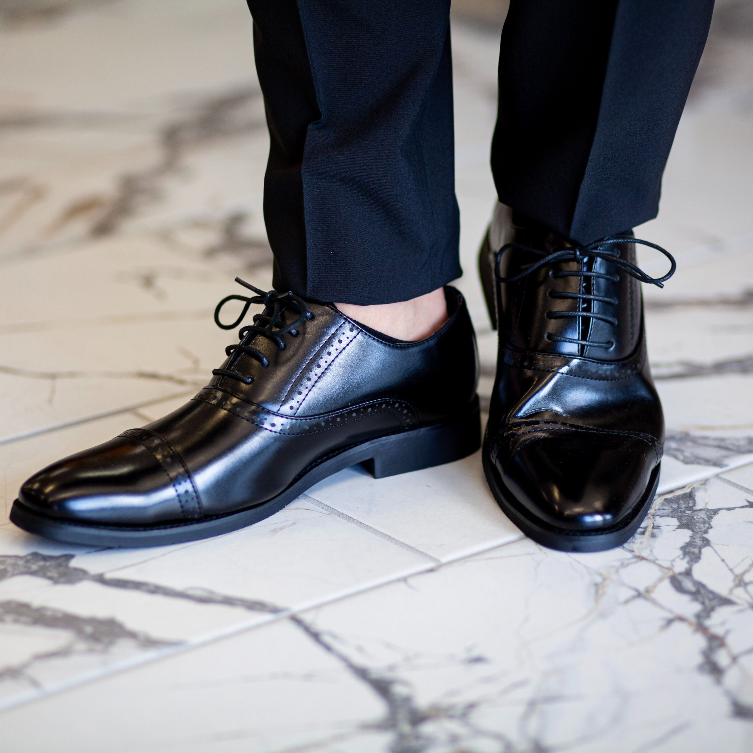 Black oxford dress shoe